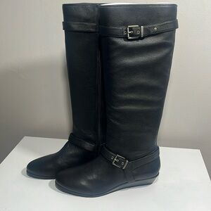 "Elegance in Every Step: Arturo Chiang Black Saddle Boots"